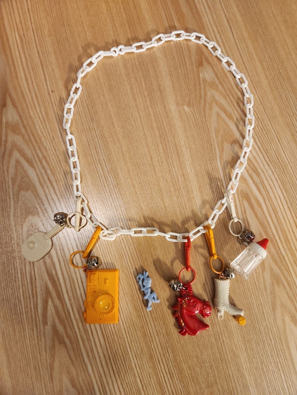 Vintage 1980's Bell Charm Plastic Clip Necklace
